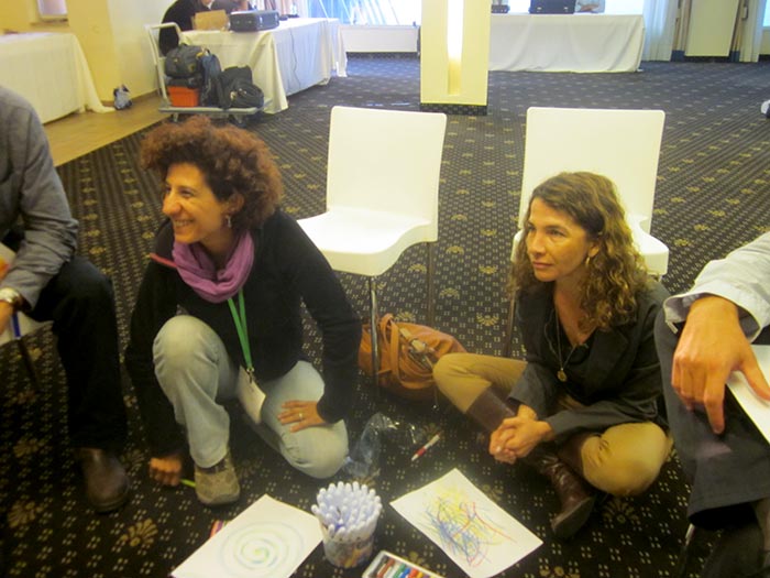 Participants in a breakout session at the Good Water Neighbors Conference sharing their visions of what they imagine a world would look like with no borders.