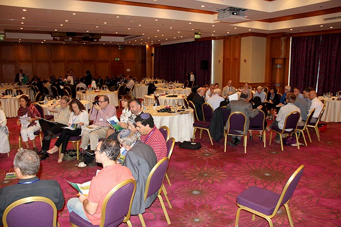 Muslims, Jews and Christians discuss FoEME's Source Books and give feedback in a breakout session.